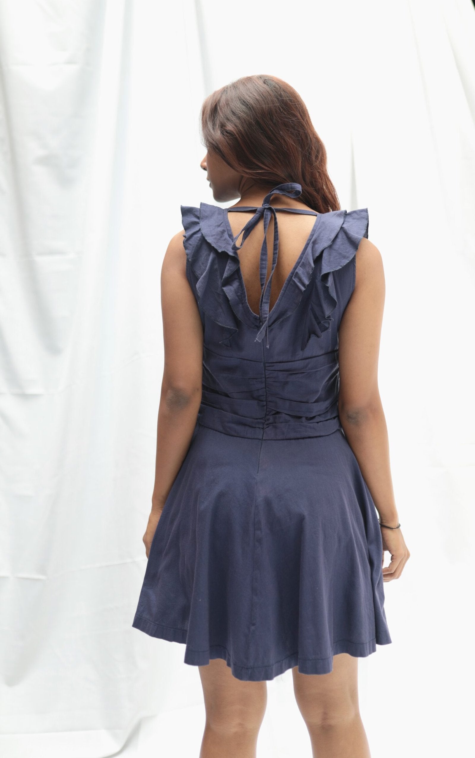 Navy blue sleeveless short dress with ruffles