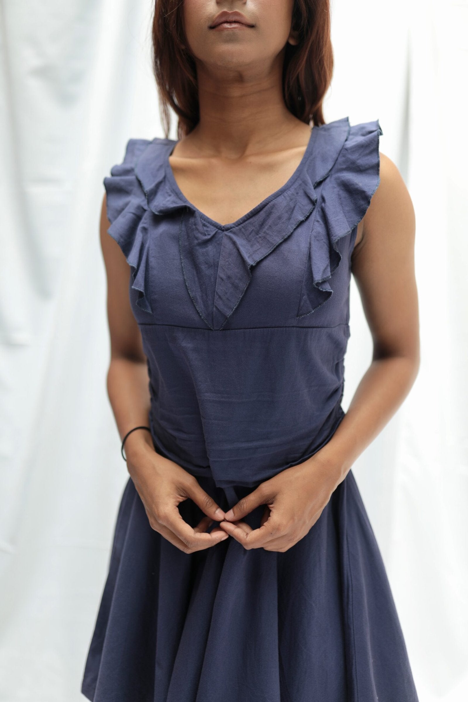 Navy blue sleeveless short dress with ruffles