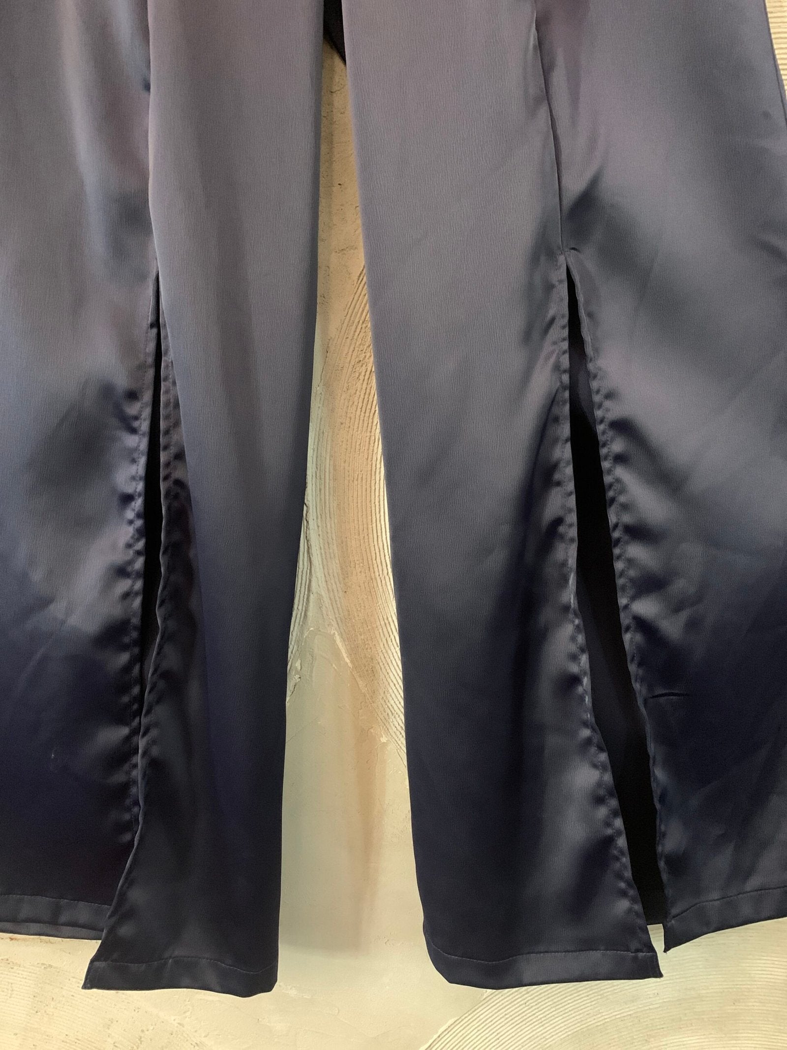 Navy blue flared trousers with slits
