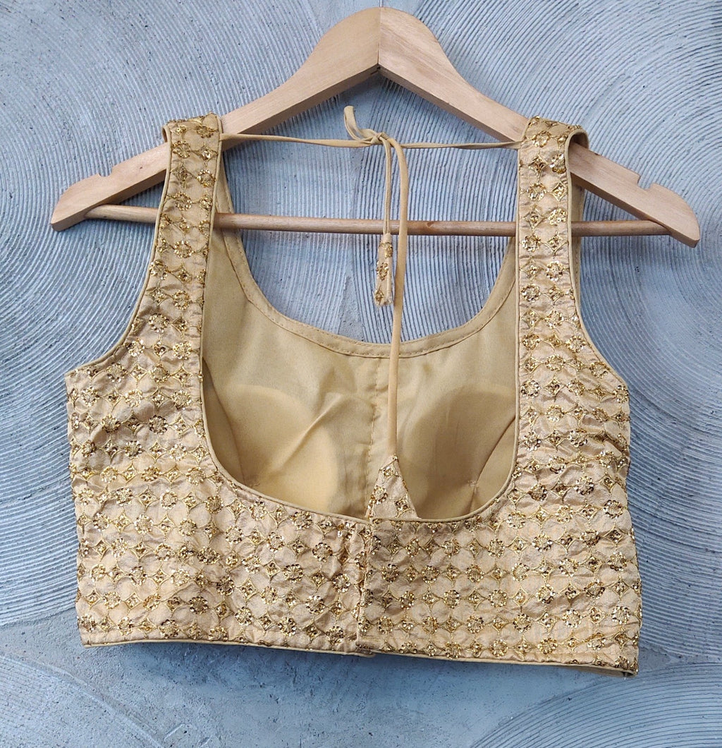 Golden Sleeveless Blouse