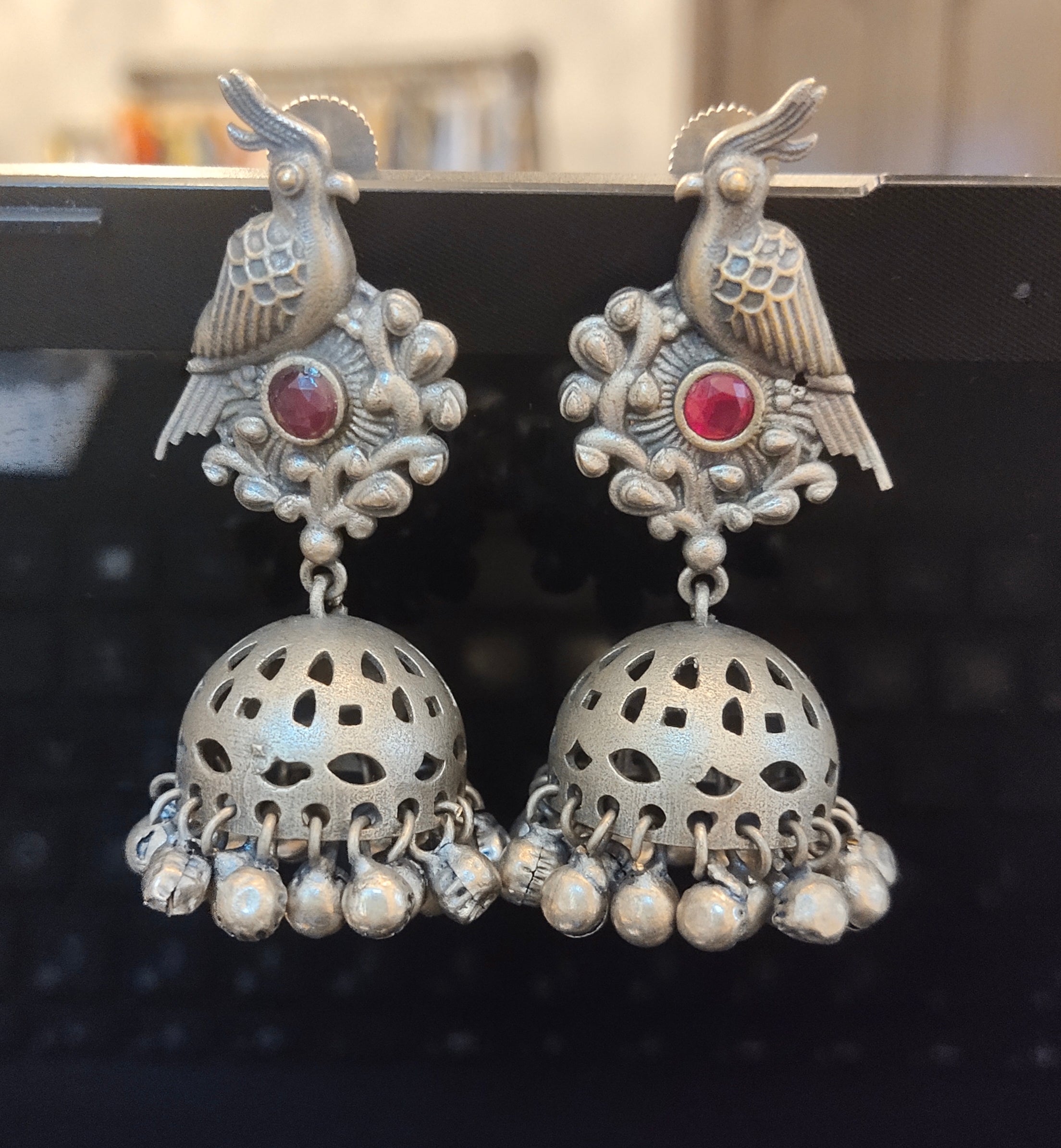 Oxidised Peacock Jhumka Earrings with Red Stones